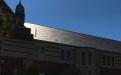 Silhouette of Stanford Lipsey Student Publications building shows slate tile pattern